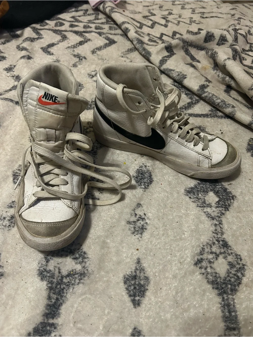 Nike White High-Top Sneakers with Black Swoosh and Red Logo